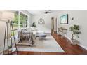 Cozy living room with natural light, plush seating, and stylish decor at 1120 Starline Se Dr, Smyrna, GA 30080