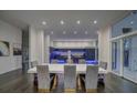 Elegant dining room with a modern table and statement lighting at 55 Serendipity Way, Atlanta, GA 30350