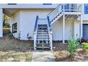 Exterior stairs leading to the upper level of the home at 2490 Woodfern Ct, Marietta, GA 30062