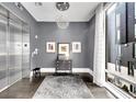Stylish lobby with elevator, modern decor, and natural light at 1301 Peachtree # 3B, Atlanta, GA 30309