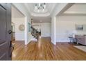 Bright entryway with hardwood floors and staircase at 5490 Conway Dr, Marietta, GA 30068