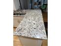 Granite countertop kitchen island with seating for two at 5958 King Way Walk, Lithonia, GA 30058