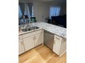 Kitchen with granite countertops and a double sink at 5958 King Way Walk, Lithonia, GA 30058
