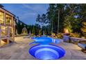 Expansive pool and spa with fire pit and lighting at 2330 Tayside Nw Xing, Kennesaw, GA 30152