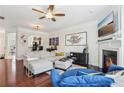 Living room features a fireplace, hardwood floors, and an open floor plan at 2367 Millhaven Se St # 15, Smyrna, GA 30080