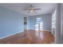 Living room features hardwood floors and light blue walls at 1110 1St Nw St, Atlanta, GA 30318