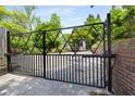 View of the property's gated entrance providing security and privacy to the home at 490 Rock Springs Ne Rd, Atlanta, GA 30324