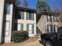 Two story building exterior with green shutters at 9400 Roberts Dr # 1C, Atlanta, GA 30350