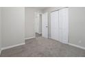 Spacious bedroom with neutral carpeting and double door closet at 748 Amber Nw, Atlanta, GA 30331