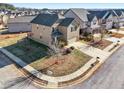 Two-story house on corner lot with driveway and street view at 2528 Shropshire Pl, Mcdonough, GA 30253