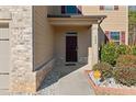 Inviting front entrance with a dark brown door and a walkway at 1752 Alford Dr, Jonesboro, GA 30236