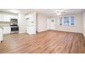 Modern kitchen with white cabinets and stainless steel appliances at 3355 Renault Se Rd, Atlanta, GA 30354