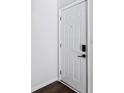 White front door with black hardware at 3293 Abbeywood Dr, Decatur, GA 30034
