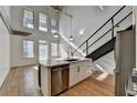 Modern kitchen with island, stainless steel appliances, and open layout at 260 18Th Nw St # 10203, Atlanta, GA 30363