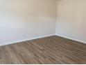 Spacious living room featuring hardwood floors at 1238 Polk Xing, Mcdonough, GA 30252
