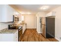Renovated kitchen, granite countertops, stainless steel appliances at 2617 Miriam Ln, Decatur, GA 30032