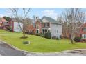 Two-story house on a corner lot with a manicured lawn at 9706 Spyglass Dr, Villa Rica, GA 30180