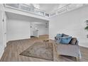 Open living room with hardwood floors and stylish decor at 346 Carpenter Dr # 51, Atlanta, GA 30328