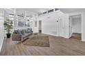 Spacious living area featuring hardwood floors and natural light at 346 Carpenter Dr # 51, Atlanta, GA 30328