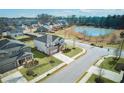 Two-story house in a neighborhood with a pond at 4749 Billow Sw Way, Mableton, GA 30126