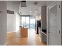 Modern kitchen with granite countertops and stainless steel appliances at 400 W Peachtree Nw St # 2303, Atlanta, GA 30308