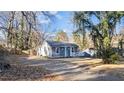 Charming home with a cozy front porch and ample parking space at 2183 Pansy Nw St, Atlanta, GA 30314