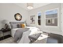 Spacious bedroom with large windows and a comfortable sitting area at 456 Parkway Ne Dr # 12, Atlanta, GA 30308