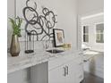 Wet bar with a marble countertop and modern sink at 456 Parkway Ne Dr # 12, Atlanta, GA 30308