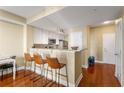 Modern kitchen with granite countertops and stainless steel appliances at 230 E Ponce De Leon Ave # 317, Decatur, GA 30030