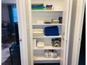 Organized linen closet features neatly stacked towels and bedding, maximizing storage space at 215 Piedmont Ne Ave # 710, Atlanta, GA 30308