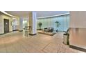 Spacious lobby with seating area and tile flooring at 20 Marietta Nw St # 6F, Atlanta, GA 30303