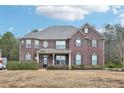 Two-story house with a brick facade and a large yard at 189 Aylesbury Blvd, Mcdonough, GA 30252