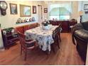 Formal dining room featuring hardwood floors and antique furniture at 4625 Gaydon Rd, Powder Springs, GA 30127