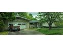 Brick ranch home with attached garage and spacious yard at 4625 Gaydon Rd, Powder Springs, GA 30127