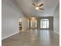 Spacious living room with vaulted ceilings, hardwood floors, and a ceiling fan at 2065 Arbor Forest Sw Dr, Marietta, GA 30064