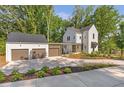 Attractive two-story home with a detached garage and ample parking space at 135 Cedarwood Ln, Roswell, GA 30075