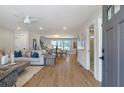 Open living area with hardwood floors, light walls, and stylish furniture at 3463 Victoria St, Atlanta, GA 30337