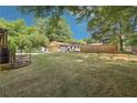 Large backyard with detached garage and wooden fence at 181 Long Dr, Marietta, GA 30060