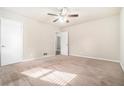 Bright bedroom with neutral carpeting and ceiling fan at 2591 Connally Dr, Atlanta, GA 30344