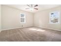 Spacious bedroom with neutral walls and carpeting at 2591 Connally Dr, Atlanta, GA 30344