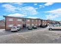 Attractive brick apartment building with parking in front at 1705 Monroe Ne Dr # B05, Atlanta, GA 30324