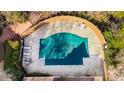 An aerial view of a community pool with a pool cover at 3047 Lenox Ne Rd # 1108, Atlanta, GA 30324