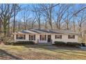 Ranch style home with a spacious yard at 409 Katherine Ln, Woodstock, GA 30189