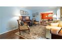 Light and airy living room with hardwood floors and piano at 2384 Bradcliff Ne Dr, Atlanta, GA 30345