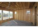 Framed living room with large windows and natural light at 2036 Ripple Park Bnd, Canton, GA 30114