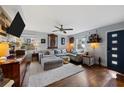 Cozy living room with hardwood floors and lots of natural light at 883 Verona Dr, Clarkston, GA 30021