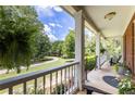 Relaxing front porch with wooded views at 675 Jack Page Ln, Canton, GA 30115