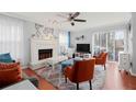 Spacious living room with fireplace and hardwood floors at 5029 David Pl, Smyrna, GA 30082