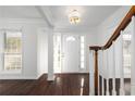 Bright entryway with hardwood floors and white walls at 3012 Lexington Ave, Woodstock, GA 30189