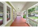 Inviting front porch with wooden deck and white railings at 776 Brookline Sw St, Atlanta, GA 30310